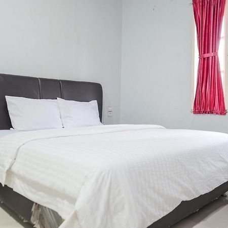 Djaboerigin Mongonsidi Guest House Redpartner ميدان المظهر الخارجي الصورة