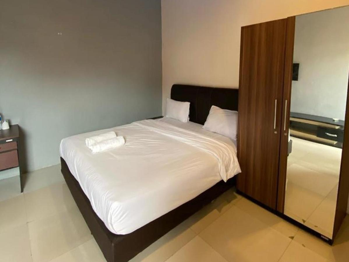 Djaboerigin Mongonsidi Guest House Redpartner ميدان المظهر الخارجي الصورة