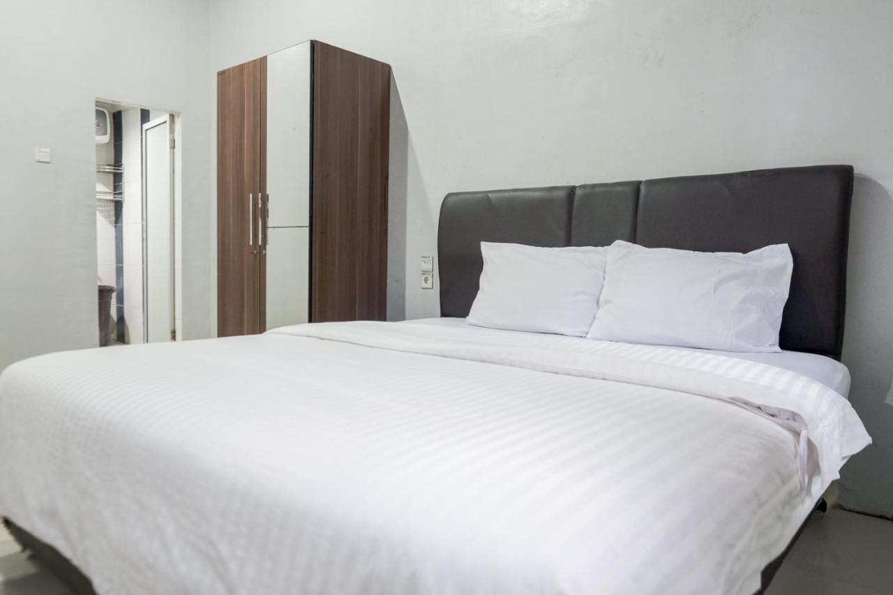 Djaboerigin Mongonsidi Guest House Redpartner ميدان المظهر الخارجي الصورة